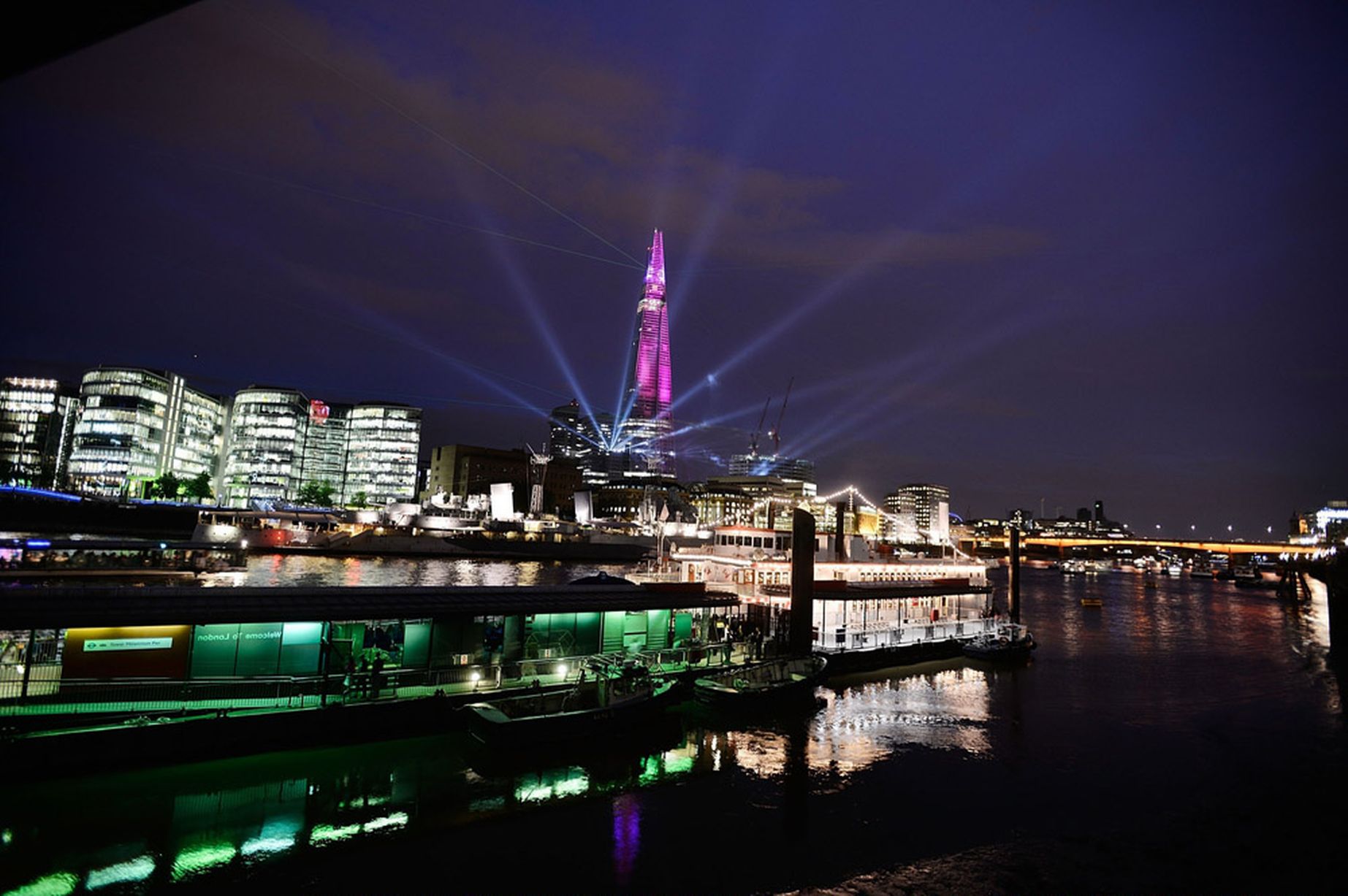 The Shard is seen lit up during a laser light show from Tower